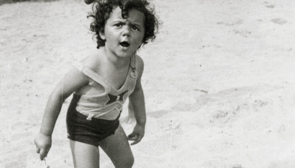 Shirley Schlanger as a child on the beach