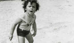 Shirley Schlanger as a child on the beach