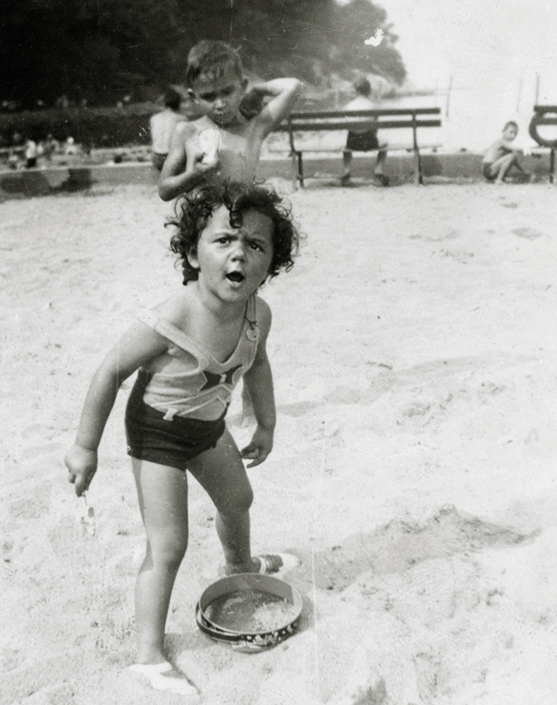 Shirley Schlanger as a child on the beach