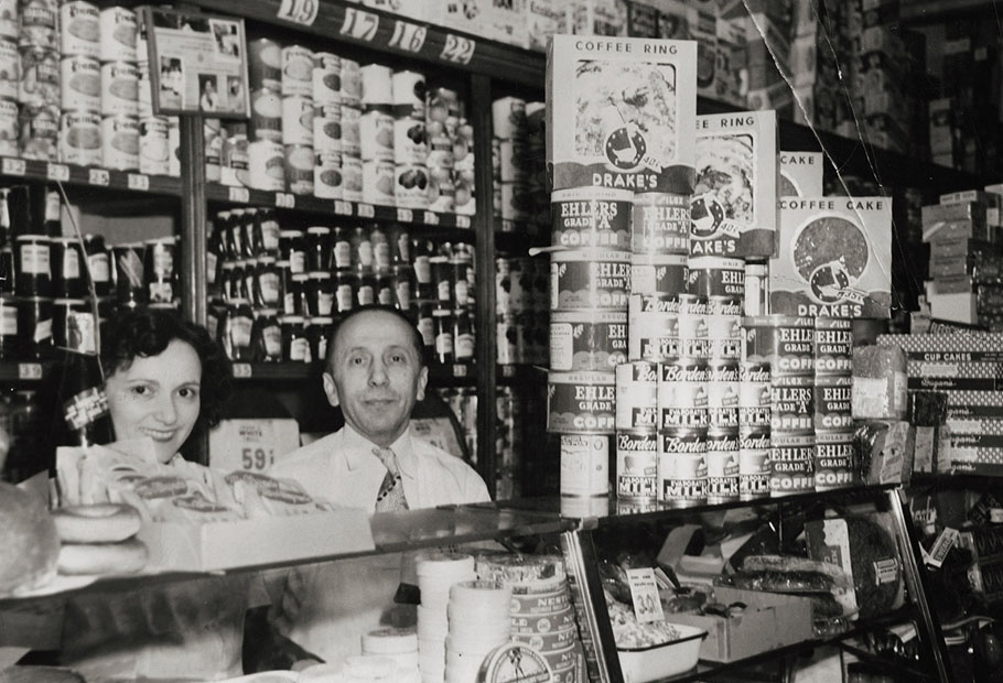 Shirley's parents in their store