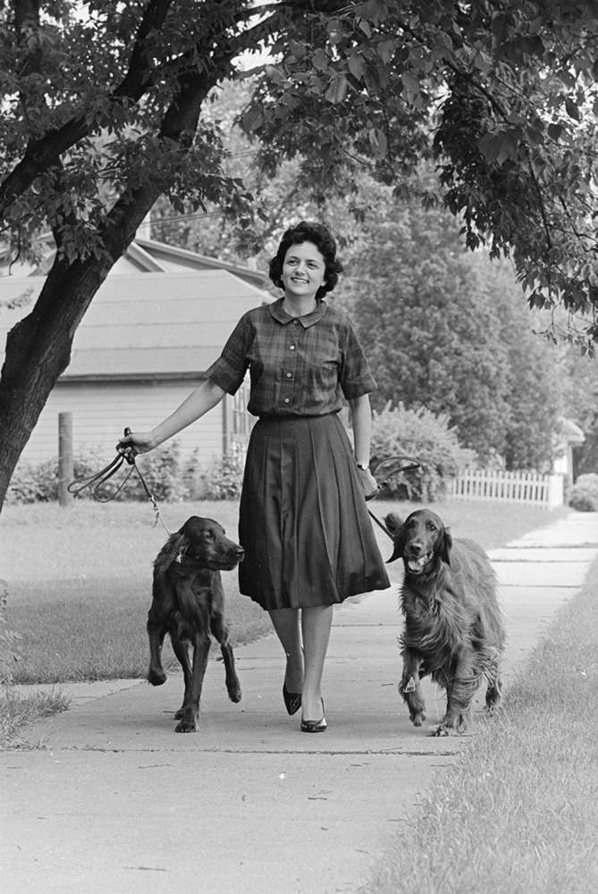 Shirley Abrahamson walking her Irish Setters. Photo: Wisconsin Historical Society ID 137633