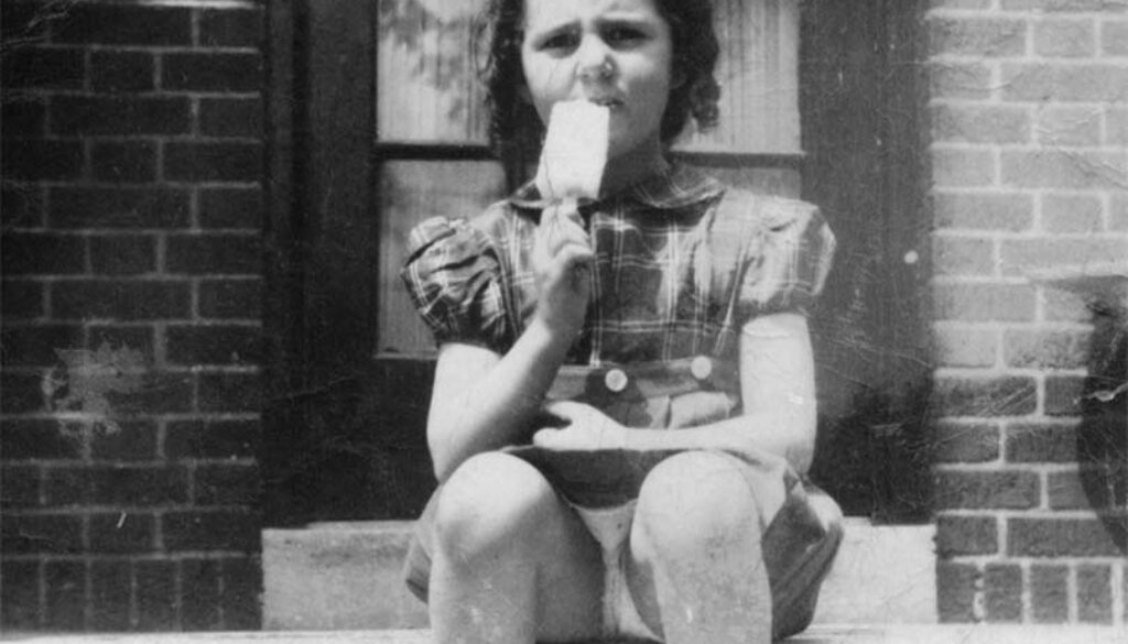 Roz eating a popsicle at age 3